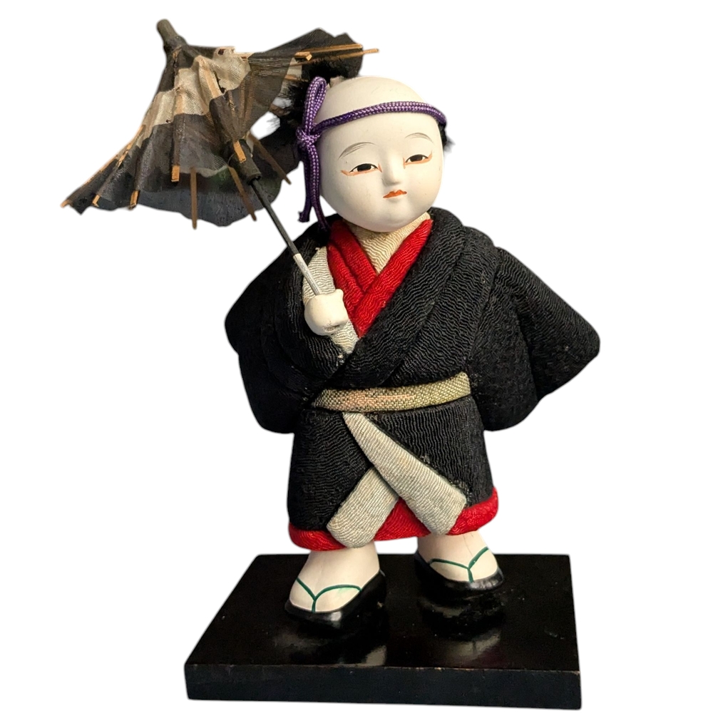 Elegant Doll with Umbrella